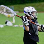 Dawgs Girls lacrosse club goalie clearing ball